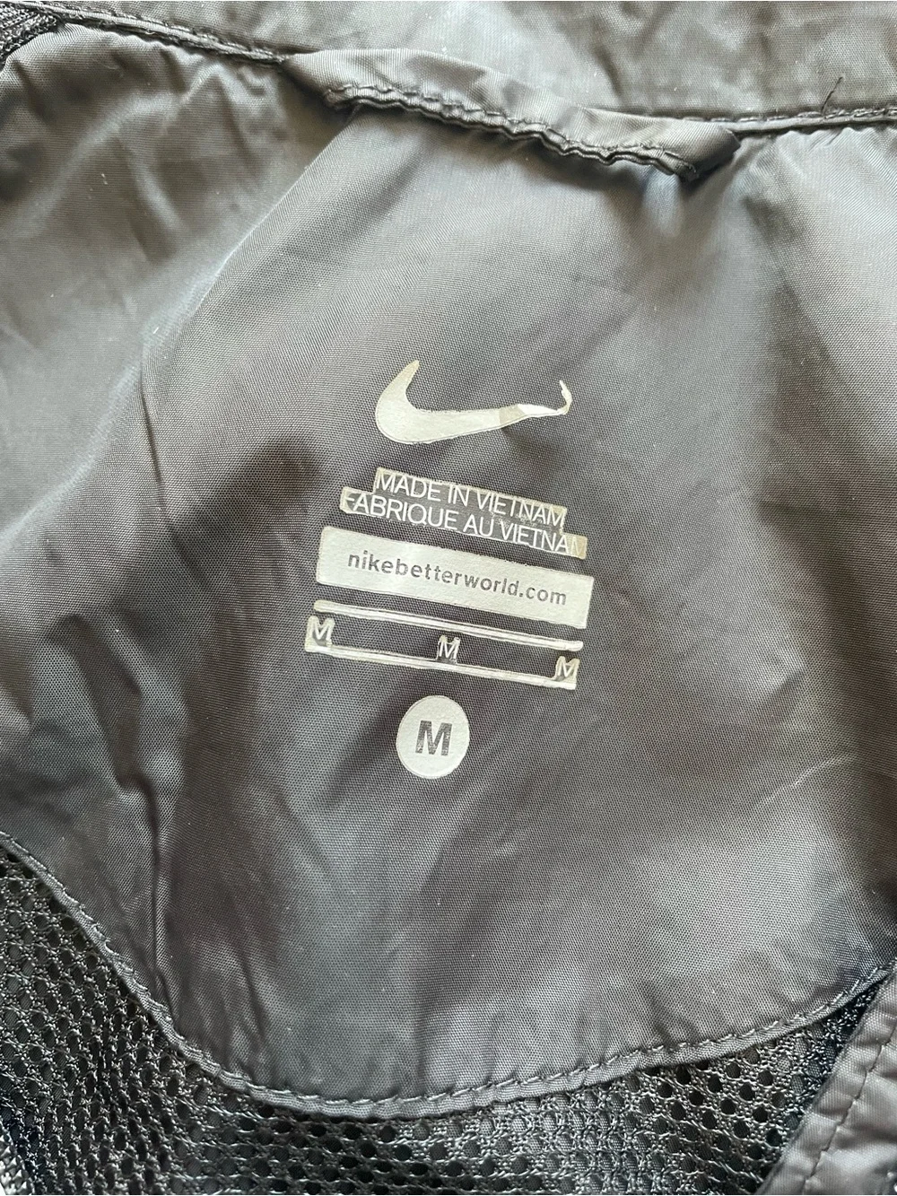 Nike lightweight windbreaker jacket black reflective women’s M medium full zip